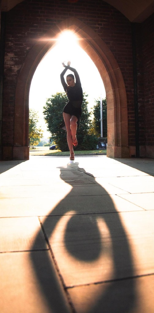 Cezara Hertanu backlit archway jump silhouette