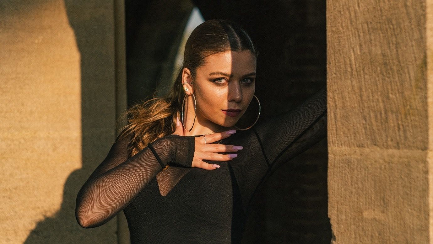 Cezara Hertanu half-lit close-up portrait