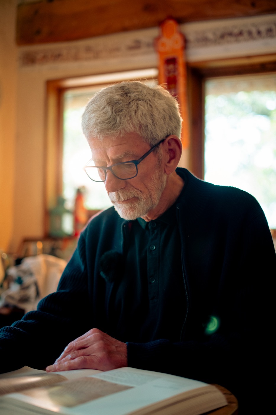 David Stokes reading at his desk